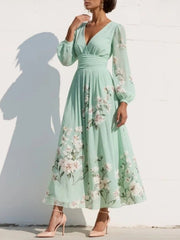 Nina | Dames Bloemenprint V-hals Geplooide Ballonmouw Midi Jurk