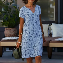 Fleur | Dames Losvallende V-hals Bladprint Zomerjurk Korte Mouw