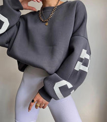 Sara | Dames Oversized Varsity-Print Fleece Crewneck Sweater