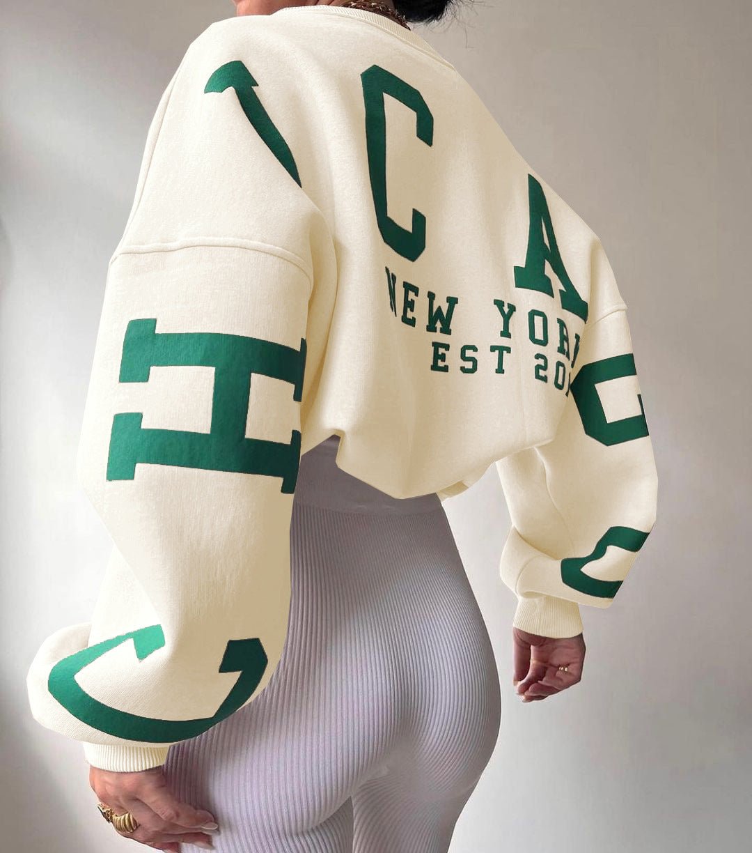 Sara | Dames Oversized Varsity-Print Fleece Crewneck Sweater