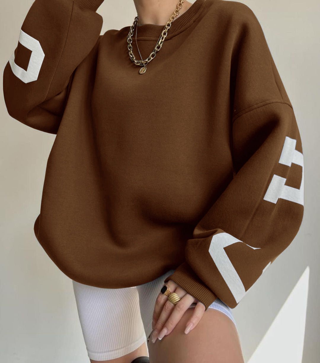 Sara | Dames Oversized Varsity-Print Fleece Crewneck Sweater