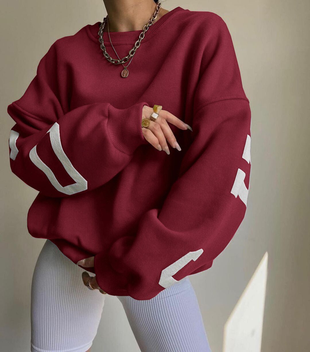 Sara | Dames Oversized Varsity-Print Fleece Crewneck Sweater